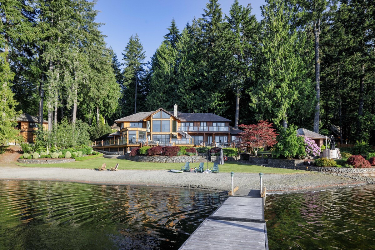 Sixty-foot floating dock and sandy beach on Shawnigan Lake